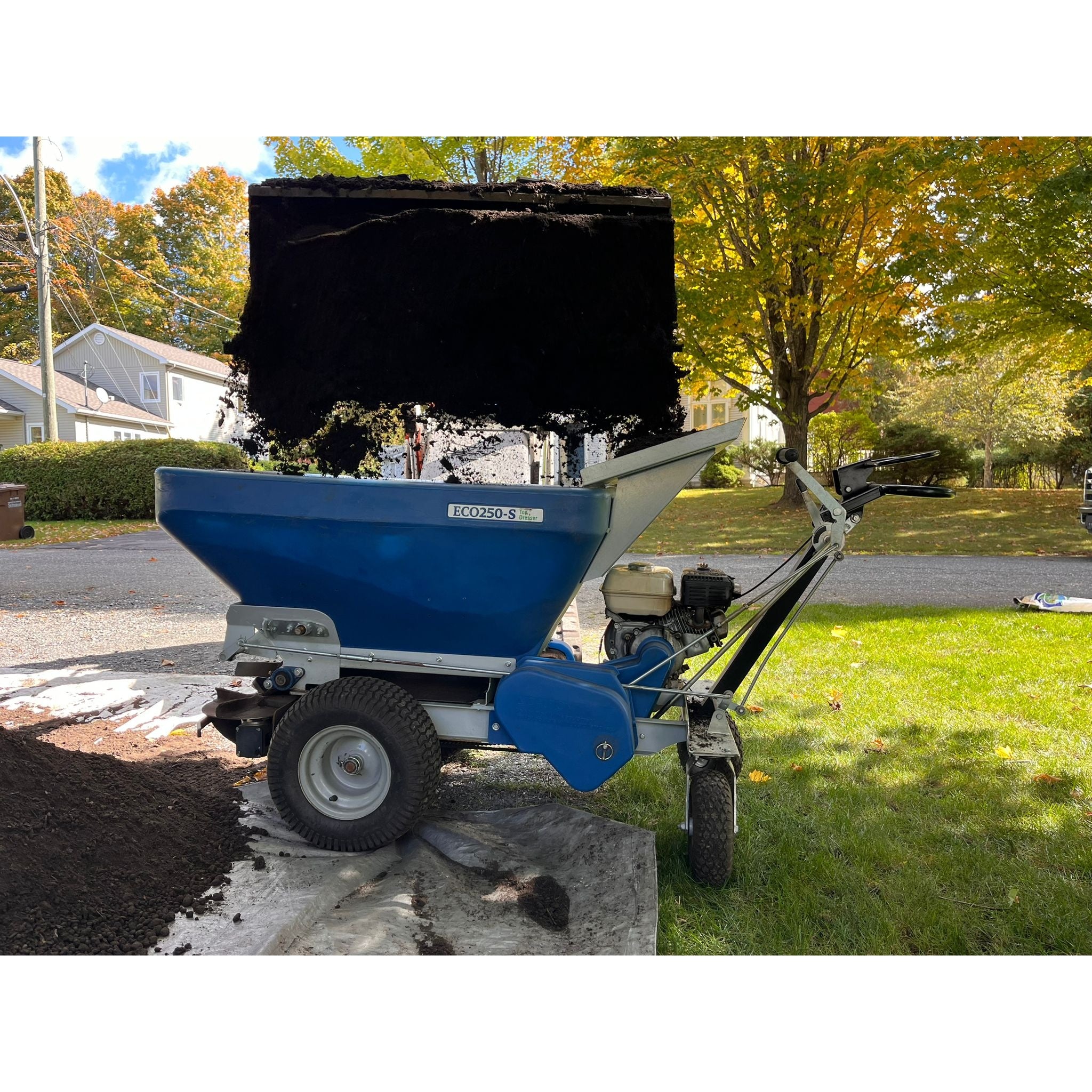 EcoLawn Hopper Funnel accessory that protects the top dresser engine